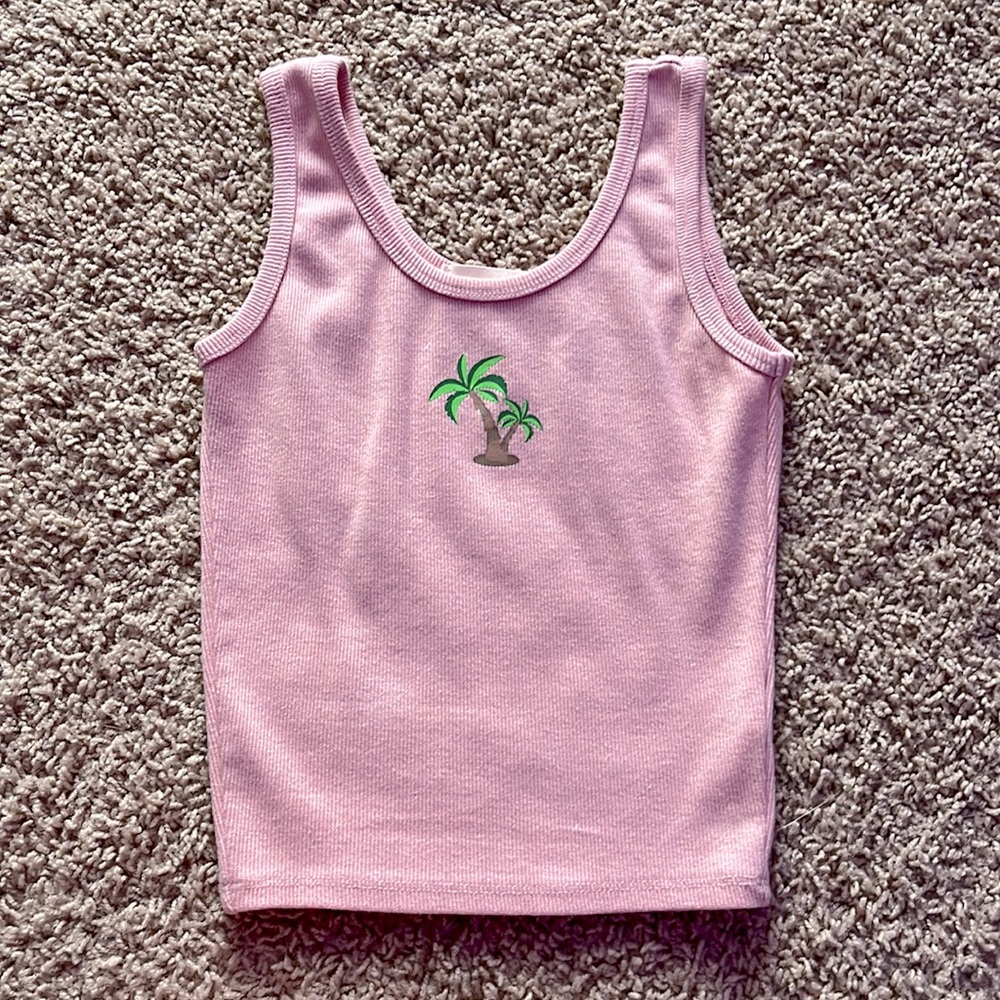 Cropped Tank Top. Comes true to size. Form fitting.